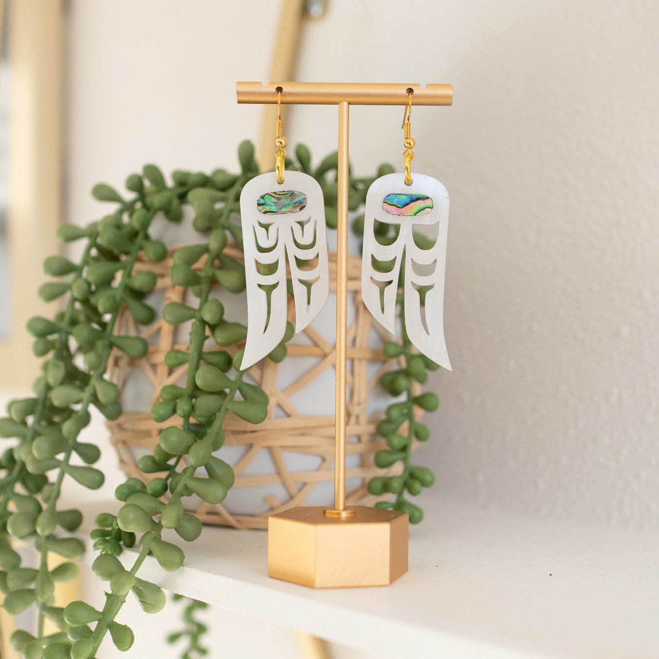 Copper Canoe Woman "Love Birds" earrings in pearlescent acrylic.
