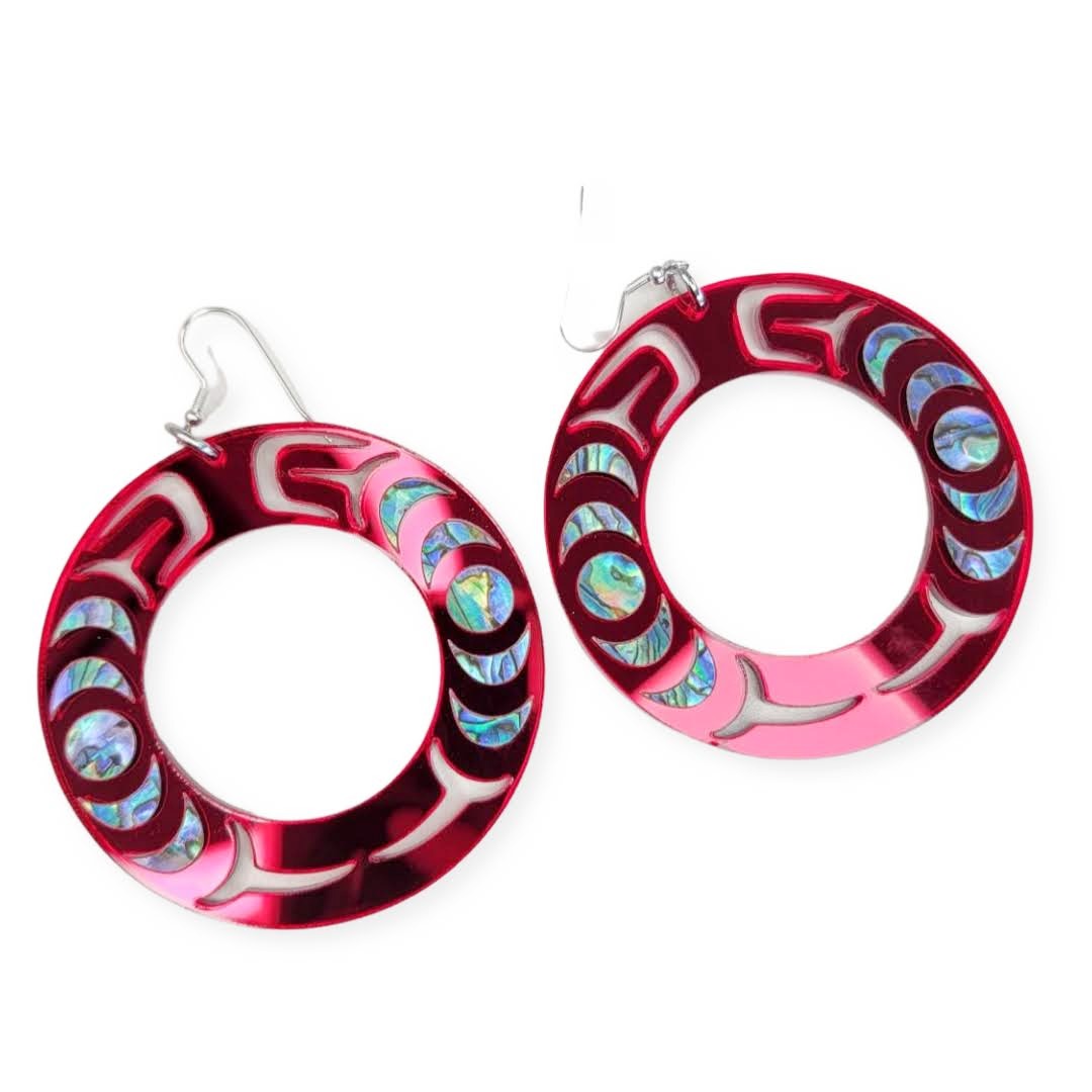 The "Nala Hoop" earring from Copper Canoe Woman in red mirror acrylic.