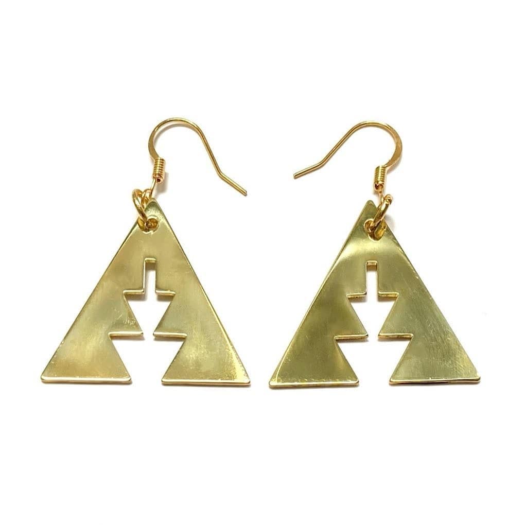 Brass triangle with southwest geometric shapes from copper canoe woman