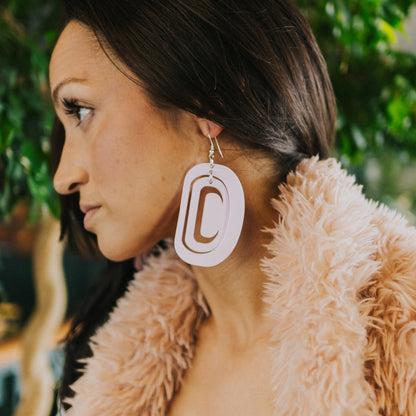 Large Ovoid Cotton Candy Crescent Earrings on Model