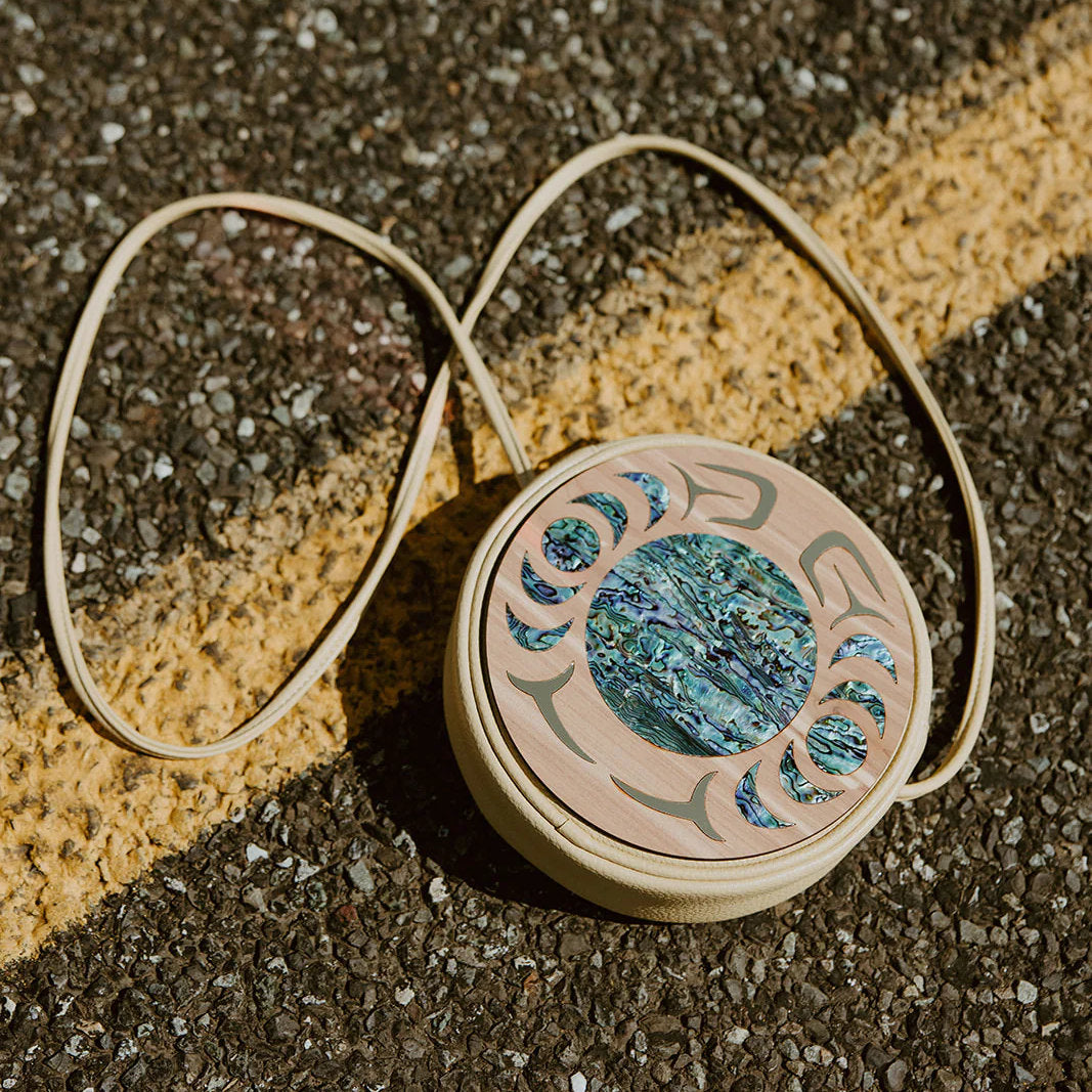 Round Indigenous art purse with abalone shell