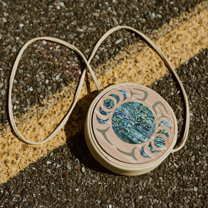 Round Indigenous art purse with abalone shell