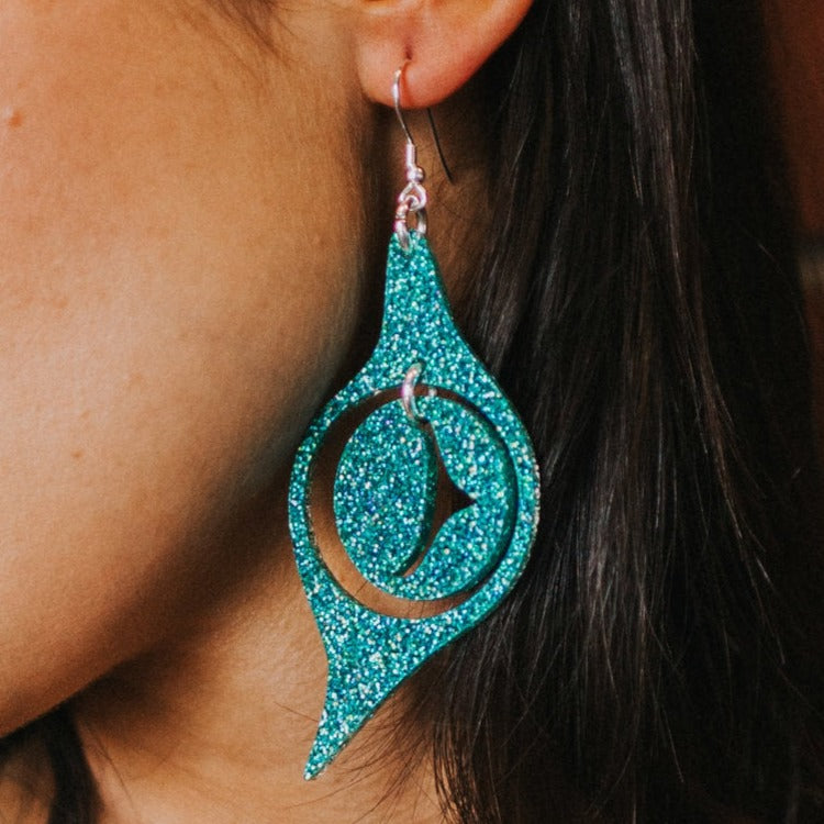 Holographic Teal Octopus Eye - Copper Canoe Woman