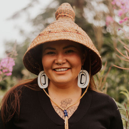 Large Ovoid Earring on White Background