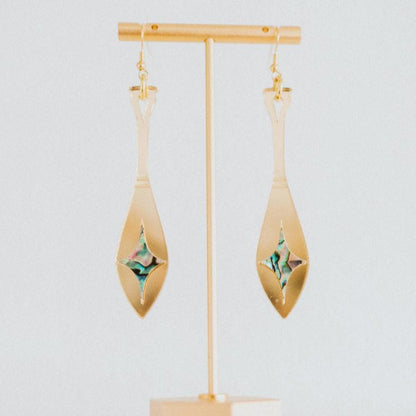 gold mirror acrylic paddle earring with star abalone inlay from copper canoe woman