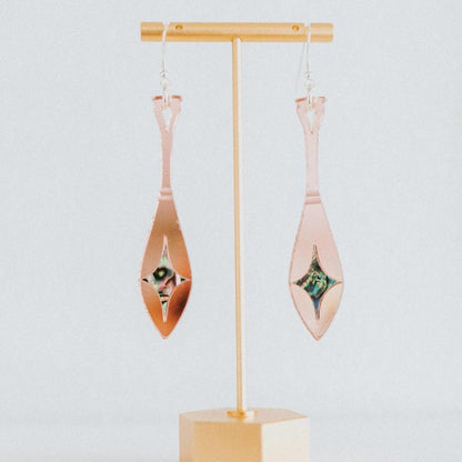 rose gold mirror acrylic paddle earring with star abalone inlay from copper canoe woman