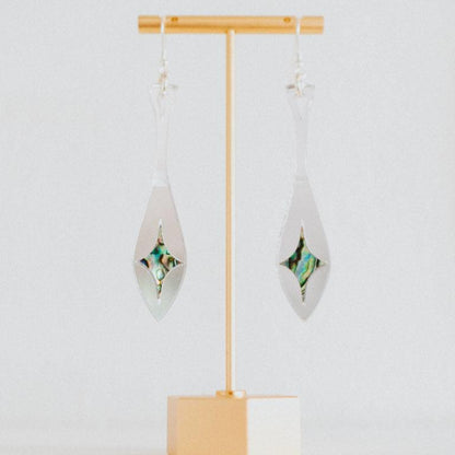 silver mirror acrylic paddle earring with star abalone inlay from copper canoe woman