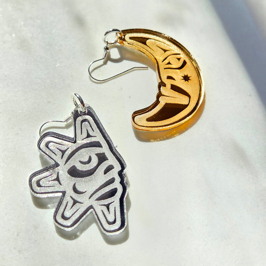 Gold mirror moon and silver mirror sun earrings.
